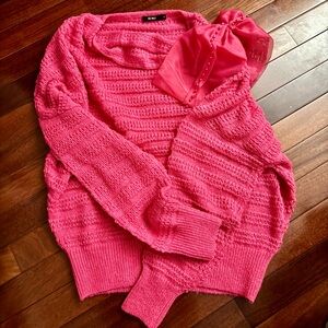 Vibrant Pink Sweater with Elegant Bow